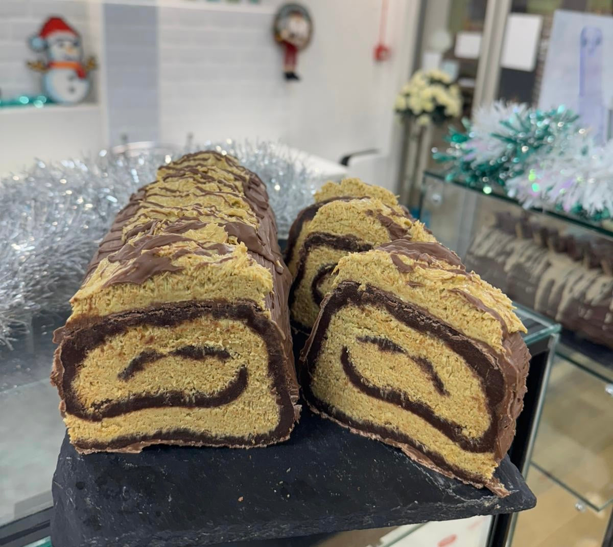 Dubai chocolate brownie yule log slice