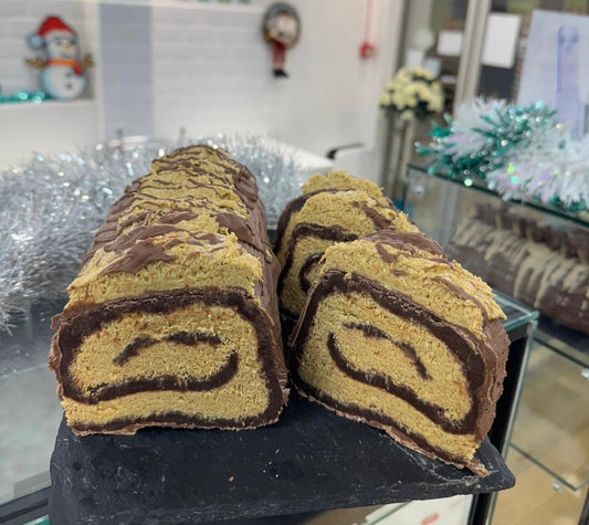Dubai chocolate brownie yule log slice